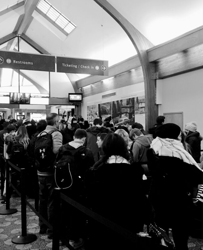 A large line outside of the security checkpoint at ASE
